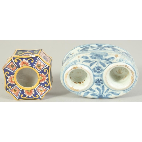 1137 - TWO FAIENCE TIN GLAZE INK POTS, one blue and white with two ink pots, the other coloured with one in... 