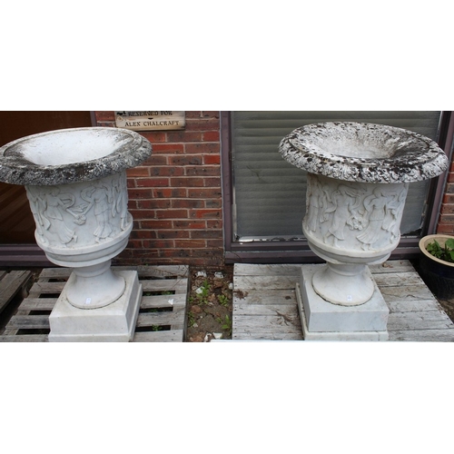 1031 - A GOOD PAIR OF CARVED ITALIAN WHITE MARBLE CAMPAGNA URNS ON PEDESTAL BASES, the urns 3ft 3ins high, ... 