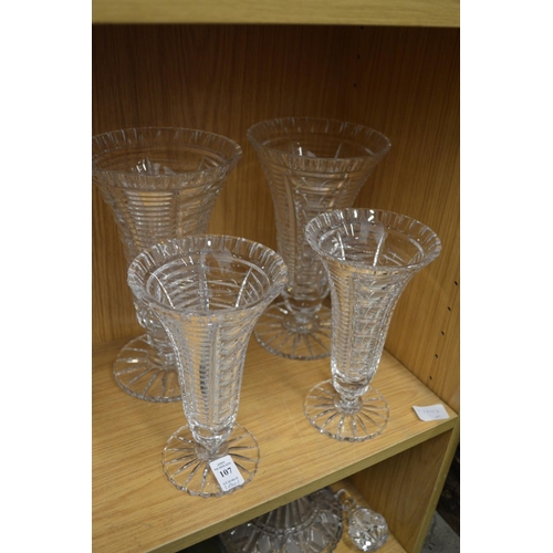 107 - Two good pairs of cut glass trumpet shaped vases.