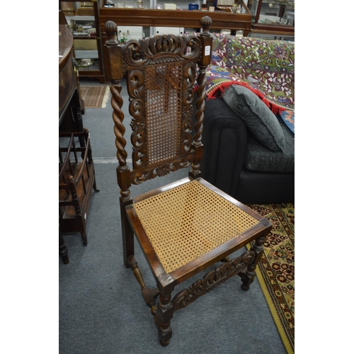 305 - A good set of Carolean style high back oak dining chairs with cane work backs and seats with leather... 