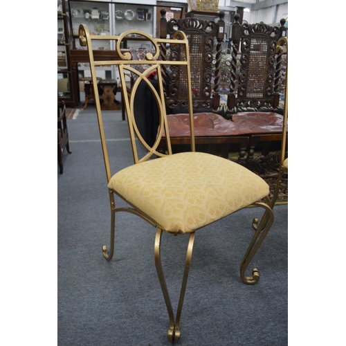 309 - A set of six gold painted wrought iron dining chairs with upholstered seats.