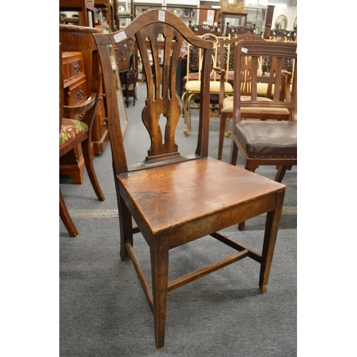 315 - A set of six 19th century elm solid seat dining chairs.