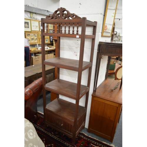 334 - A pair of Eastern hardwood three tier shelving units with storage below.