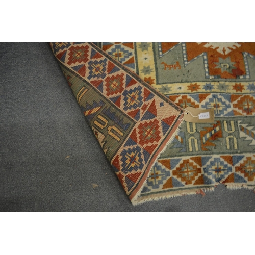 349 - A Kilim style carpet, some wear and damage, 205cm x 135cm.