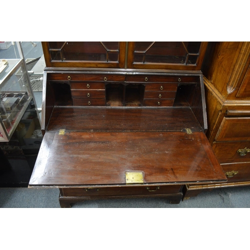 366 - A George III mahogany bureau bookcase.