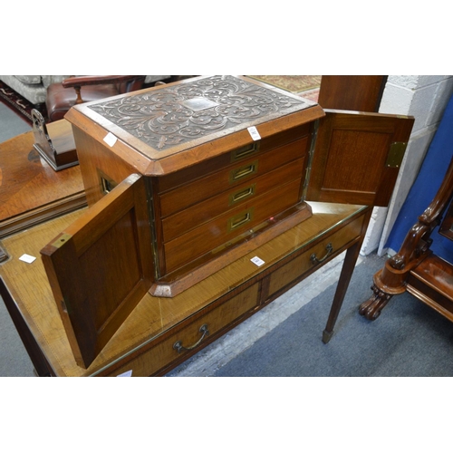 382 - A good Victorian carved walnut four drawer table canteen.