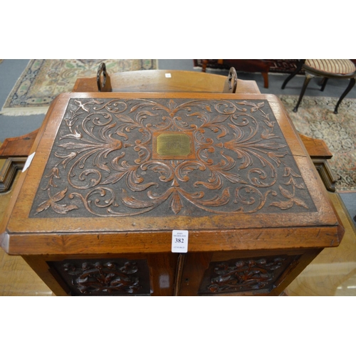 382 - A good Victorian carved walnut four drawer table canteen.