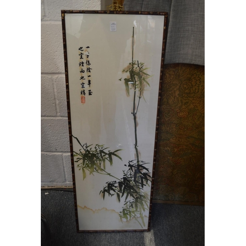 501 - A pair of Japanese embroidered pictures depicting flora and fauna.