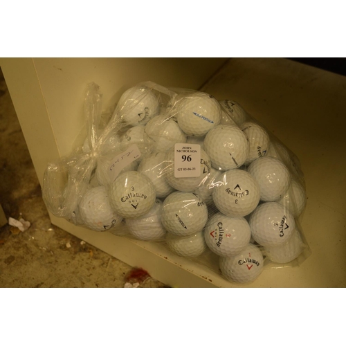 96 - A bag of golf balls.