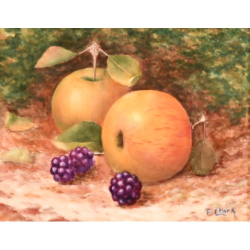 198 - F. Clark, a painted porcelain tile of apples and blackberries, signed, 3.25
