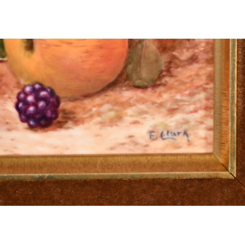 198 - F. Clark, a painted porcelain tile of apples and blackberries, signed, 3.25