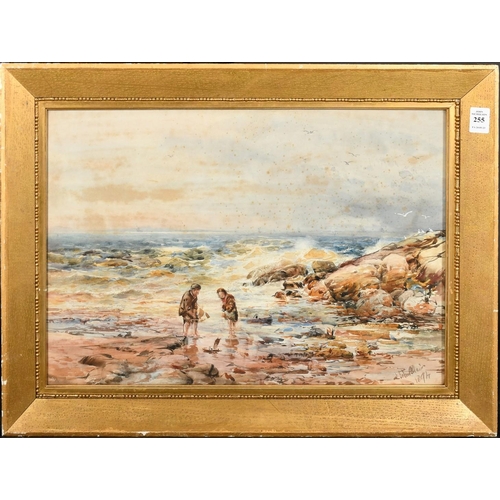 231 - John Blair (fl.1885-1888), A rugged coastal scene with two children playing with toy boats, watercol... 