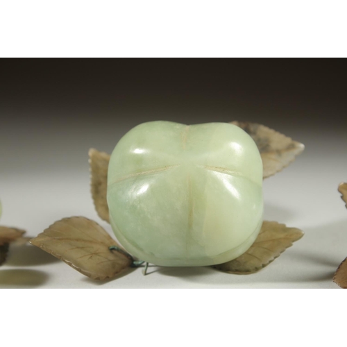 20 - A CARVED JADE BUNCH OF GRAPES, together with another similar hardstone group and a large carved jade... 