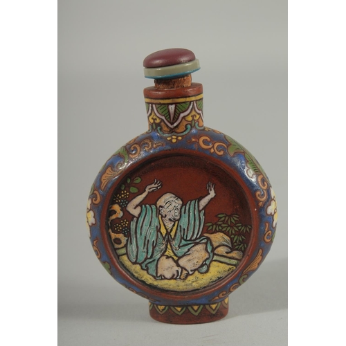 31 - AN UNUSUAL CHINESE YIXING SNUFF BOTTLE AND STOPPER, with enamel painted decoration, 8.5cm high.
