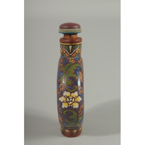31 - AN UNUSUAL CHINESE YIXING SNUFF BOTTLE AND STOPPER, with enamel painted decoration, 8.5cm high.