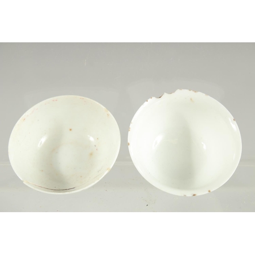 33 - TWO VERY SMALL CHINESE TATHONG CHANNEL SHIPWRECK TEA BOWLS, 1969, (af), 5cm diameter.