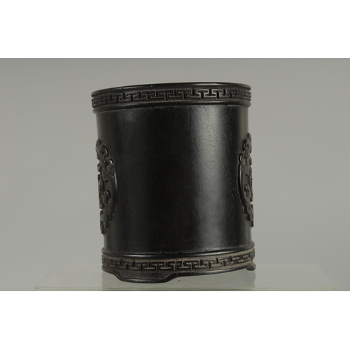 49 - A CHINESE HARDWOOD BRUSH POT; possibly zitan wood, 13cm high.