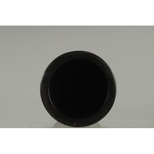 49 - A CHINESE HARDWOOD BRUSH POT; possibly zitan wood, 13cm high.