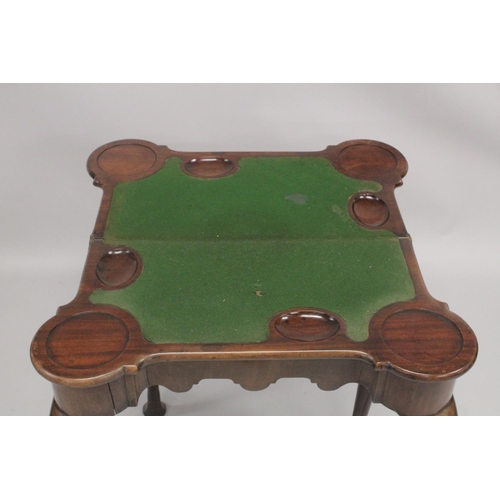 1005 - A GOOD GEORGE II MAHOGANY SHAPED FOLDING SWIVEL TOP CARD TABLE with green baize cover and counter we... 