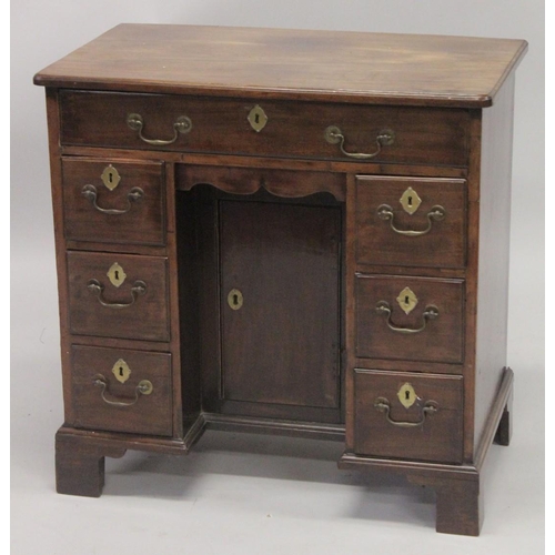 1014 - A GOOD GEORGE III MAHOGANY KNEEHOLE DESK with plain top, three small drawers either side of the knee... 