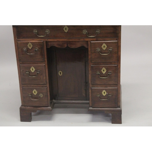 1014 - A GOOD GEORGE III MAHOGANY KNEEHOLE DESK with plain top, three small drawers either side of the knee... 