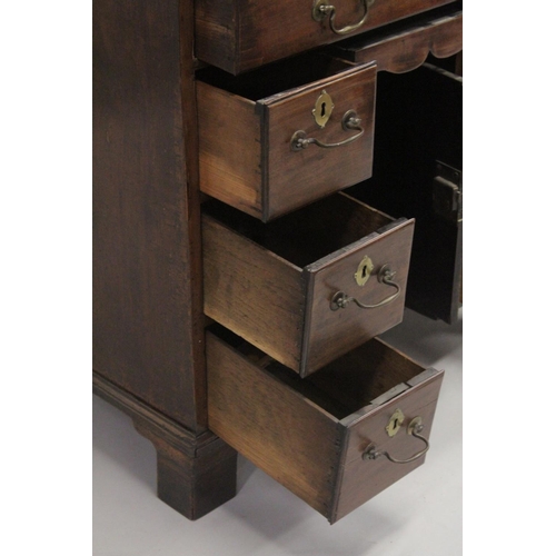 1014 - A GOOD GEORGE III MAHOGANY KNEEHOLE DESK with plain top, three small drawers either side of the knee... 