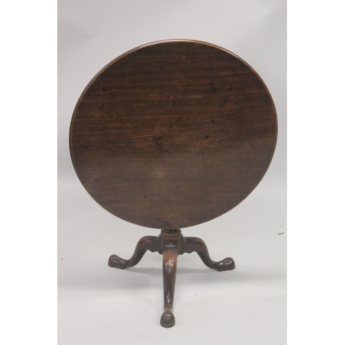 1015 - A LARGE GEORGE III MAHOGANY CIRCULAR TOP TABLE with birdcage support, centre turned pillar ending in... 