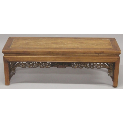 1026 - A CHINESE REDWOOD OPIUM TABLE 4ft long, 1ft4ins high.