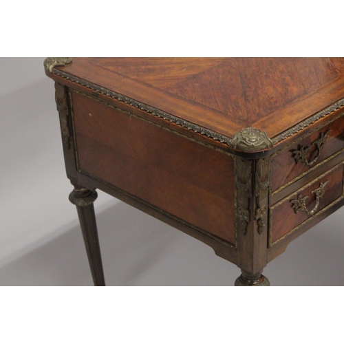 1027 - A LOUIS XVITH DESIGN WRITING TABLE with wooden top, five drawers on turned legs with ormolu mounts. ... 