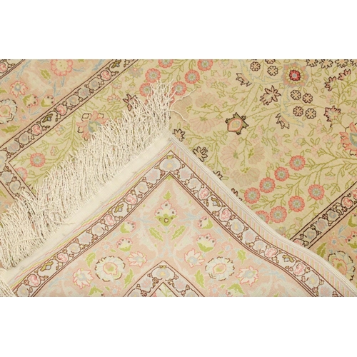 1037 - A GOOD SMALL PERSIAN SILK RUG, CREAM GROUND with stylised floral decoration, within a similar border... 