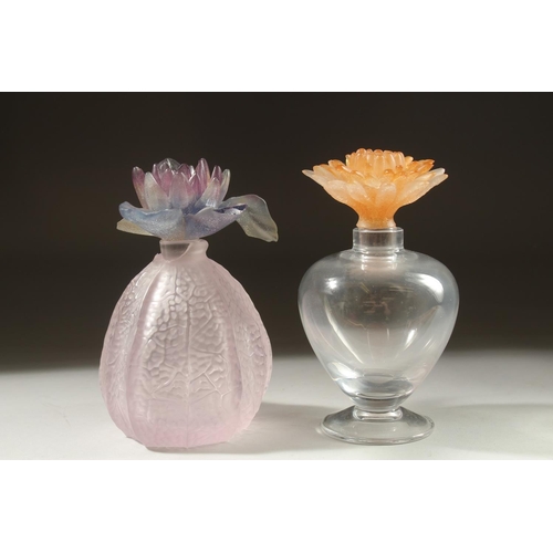 1046 - TWO DAUM GLASS SCENT BOTTLES with coloured flower stopper, (one a/f).