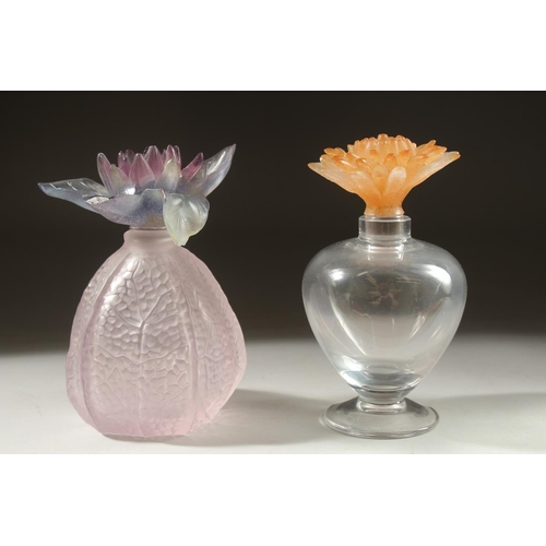 1046 - TWO DAUM GLASS SCENT BOTTLES with coloured flower stopper, (one a/f).