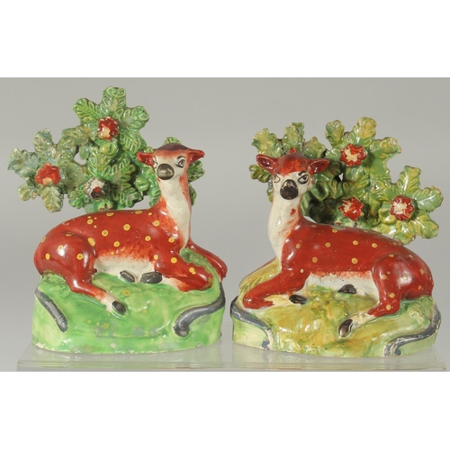 1062 - A PAIR OF STAFFORDSHIRE BOCAGE GROUP OF SHEEP AND LAMBS with Bocage backs. 6ins high.