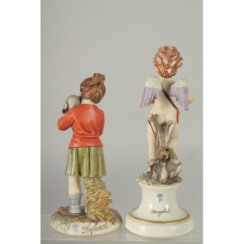 1073 - TWO CAPODIMONTE PORCELAIN FIGURES a cupid and A YOUNG MAN with a dog. 8ins and 7ins high (2).