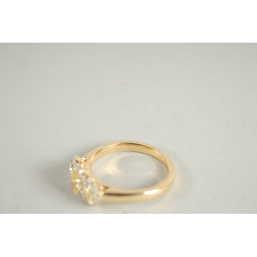 1657 - A FINE 18 CARAT YELLOW GOLD, NATURAL YELLOW DIAMOND AND DIAMOND RING.