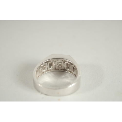 1662 - A HEAVY 18CT WHITE GOLD, HALLLMARKED TABLET RING. Diamonds approx. 0.5 carat.