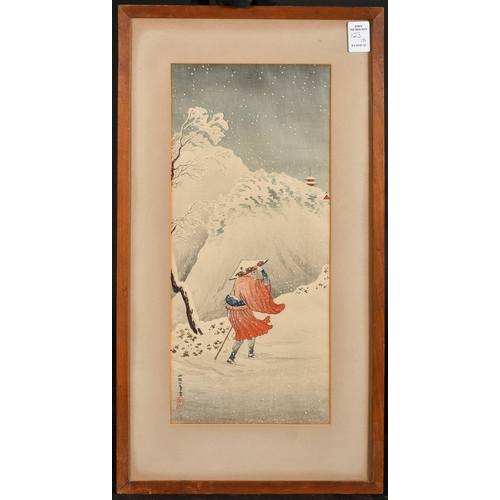 123 - Takashi Hiroaki, a Japanese woodblock, figure on a snowy mountain path and another by the same hand,... 