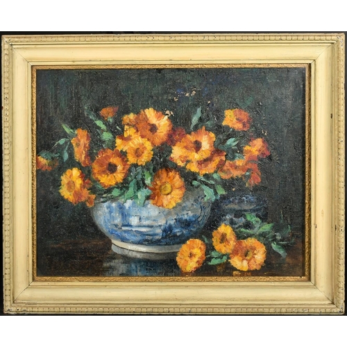 400 - 20th Century, a still life of orange flowers in an Oriental bowl, oil on canvas, indistinctly signed... 