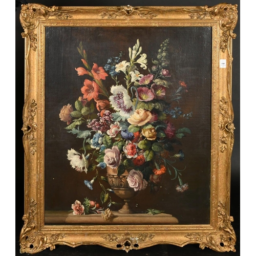 404 - Early 19th Century French, A still life of mixed Summer flowers in an urn on a ledge, oil on canvas,... 