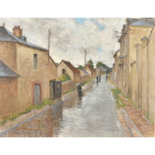 5 - Constant Dore (20th Century) French, figures with umbrellas in a French town, oil on canvas, signed,... 