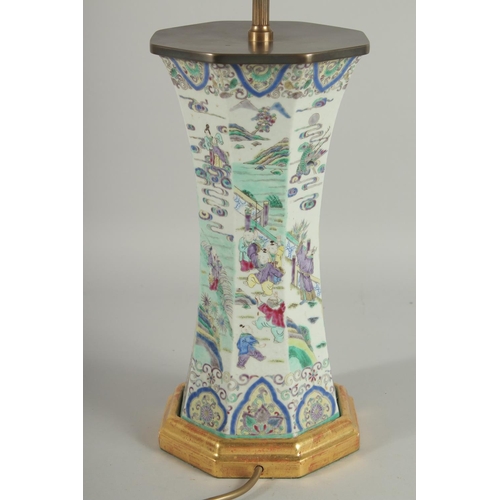 1 - A 19TH CENTURY FAMILLE VERTE PORCELAIN OCTAGONAL VASE, converted to a lamp, painted with various fig... 