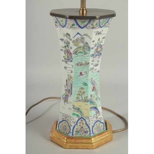 1 - A 19TH CENTURY FAMILLE VERTE PORCELAIN OCTAGONAL VASE, converted to a lamp, painted with various fig... 