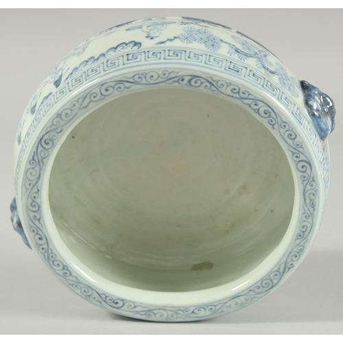 105 - A CHINESE BLUE AND WHITE PORCELAIN BOWL, with moulded twin handles and decorated with figures, 19cm ... 