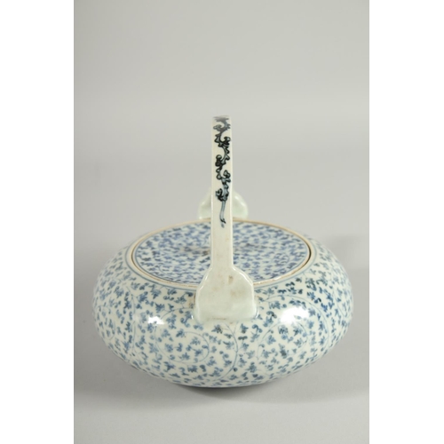 106 - A JAPANESE BLUE AND WHITE PORCELAIN TEAPOT, with foliate decoration.