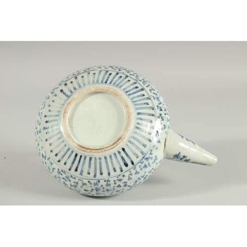 106 - A JAPANESE BLUE AND WHITE PORCELAIN TEAPOT, with foliate decoration.