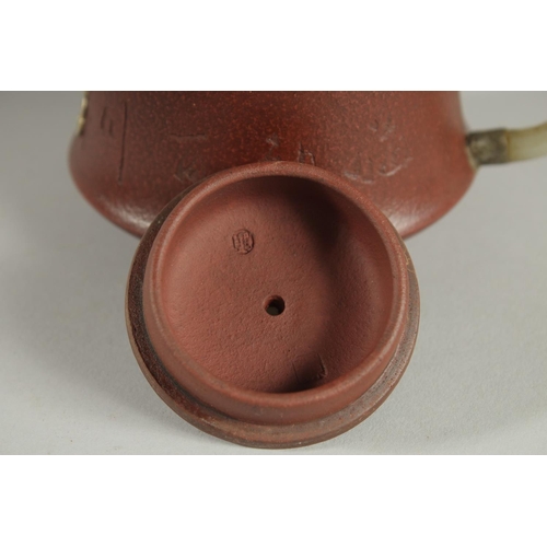 110 - A CHINESE YIXING TEAPOT WITH MOUNDED JADE HANDLE AND SPOUT, with impressed marks to base and inner l... 