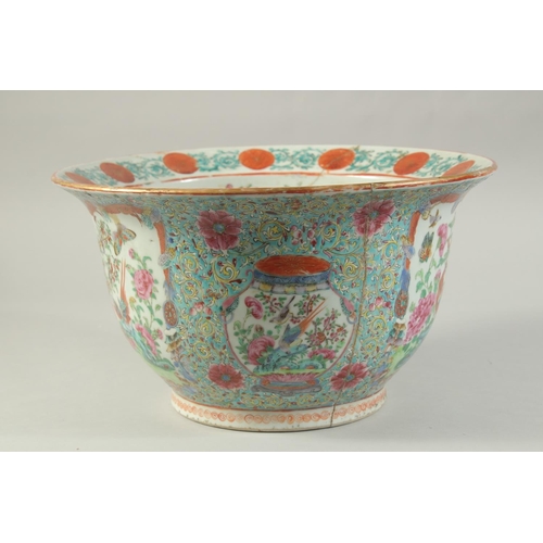 113 - A CHINESE FAMILLE ROSE PORCELAIN JARDINIERE, painted with colourful panels of exotic birds, butterfl... 