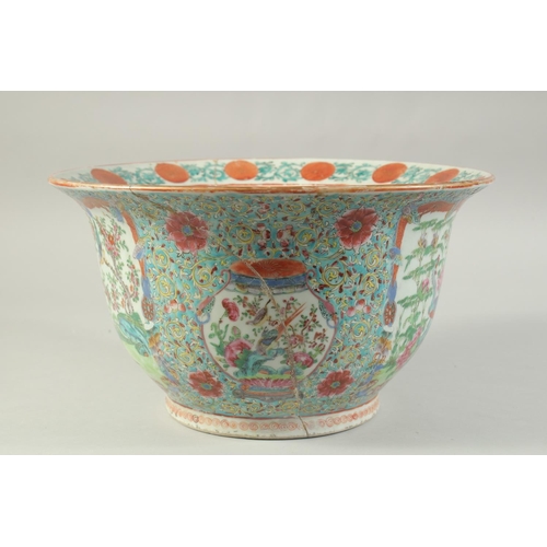 113 - A CHINESE FAMILLE ROSE PORCELAIN JARDINIERE, painted with colourful panels of exotic birds, butterfl... 