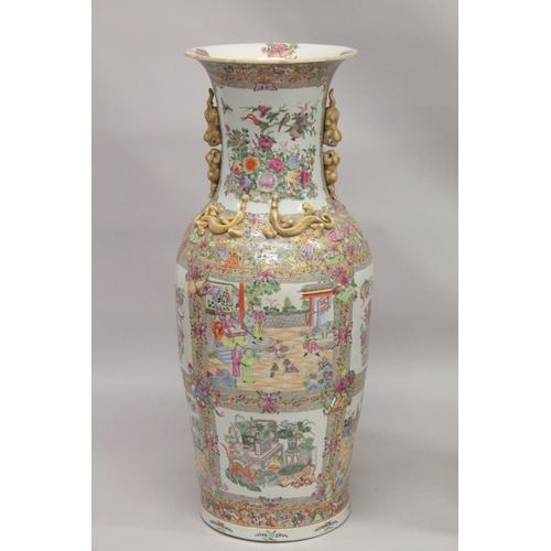 115 - AN IMPRESSIVE PAIR OF CHINESE CANTON FAMILLE ROSE PORCELAIN FLOOR-STANDING VASES, beautifully painte... 