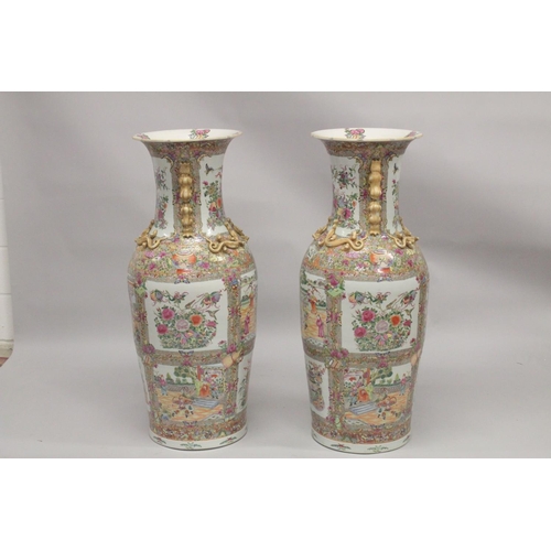 115 - AN IMPRESSIVE PAIR OF CHINESE CANTON FAMILLE ROSE PORCELAIN FLOOR-STANDING VASES, beautifully painte... 